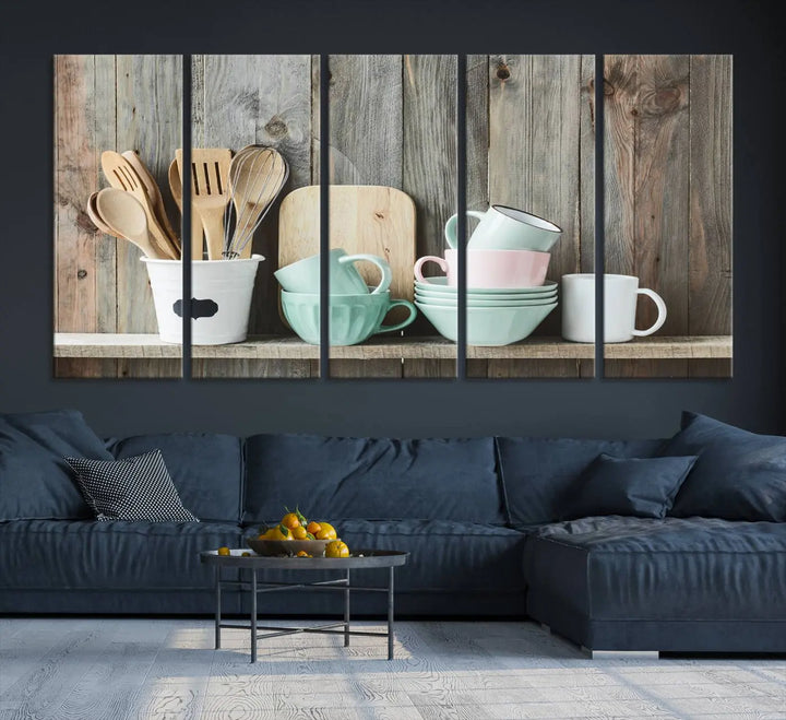 The "Kitchenware on Rustic Woods Canvas" features a triptych of kitchen utensils and cups. This piece evokes artistry reminiscent of museum-quality canvases, with each detail appearing as if handcrafted in the USA.