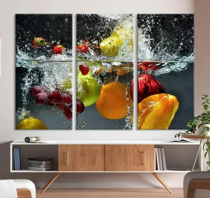 The "Kitchen Vegetables World Wall Art Canvas Print," featuring a triptych design on museum-quality canvas with a UV-protective coating, captures the dynamic scene of fruits splashing into water. Enjoy this vibrant piece with free shipping.