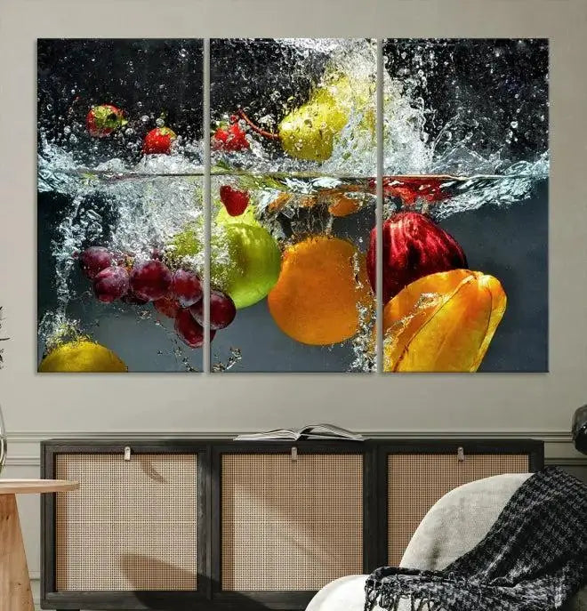 The "Kitchen Vegetables World Wall Art Canvas Print," featuring a triptych design on museum-quality canvas with a UV-protective coating, captures the dynamic scene of fruits splashing into water. Enjoy this vibrant piece with free shipping.