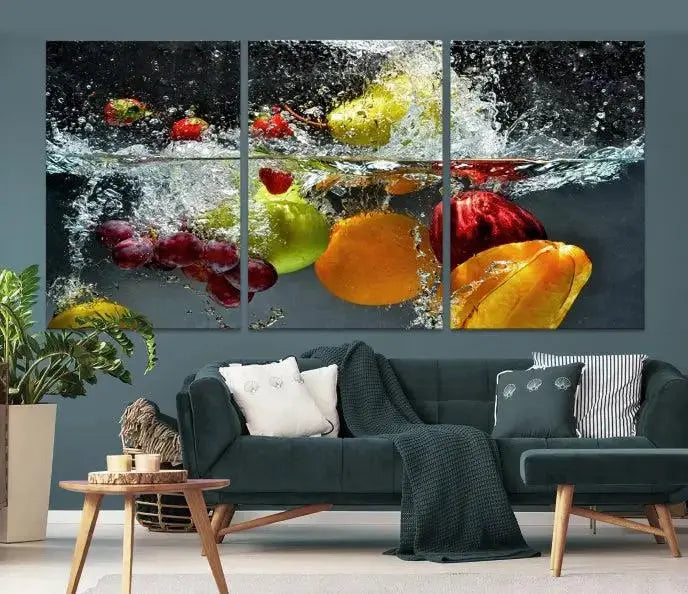 The "Kitchen Vegetables World Wall Art Canvas Print," featuring a triptych design on museum-quality canvas with a UV-protective coating, captures the dynamic scene of fruits splashing into water. Enjoy this vibrant piece with free shipping.