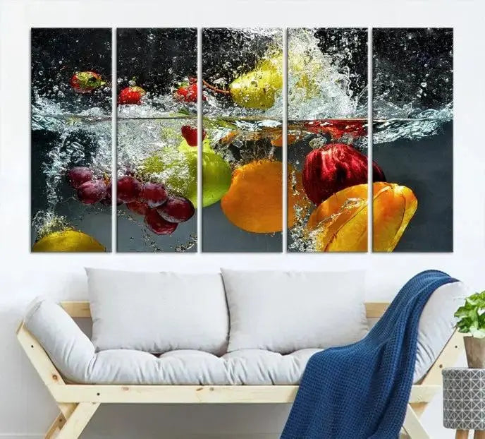 The "Kitchen Vegetables World Wall Art Canvas Print," featuring a triptych design on museum-quality canvas with a UV-protective coating, captures the dynamic scene of fruits splashing into water. Enjoy this vibrant piece with free shipping.