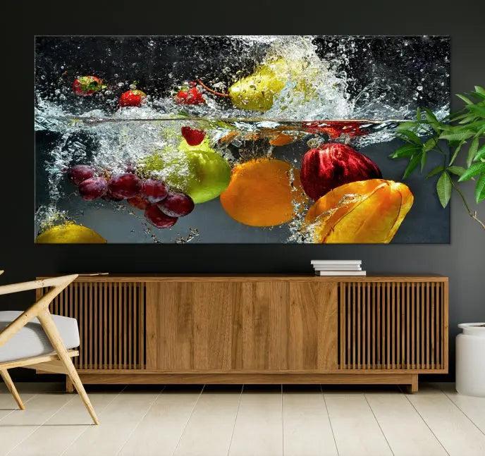 The "Kitchen Vegetables World Wall Art Canvas Print," featuring a triptych design on museum-quality canvas with a UV-protective coating, captures the dynamic scene of fruits splashing into water. Enjoy this vibrant piece with free shipping.