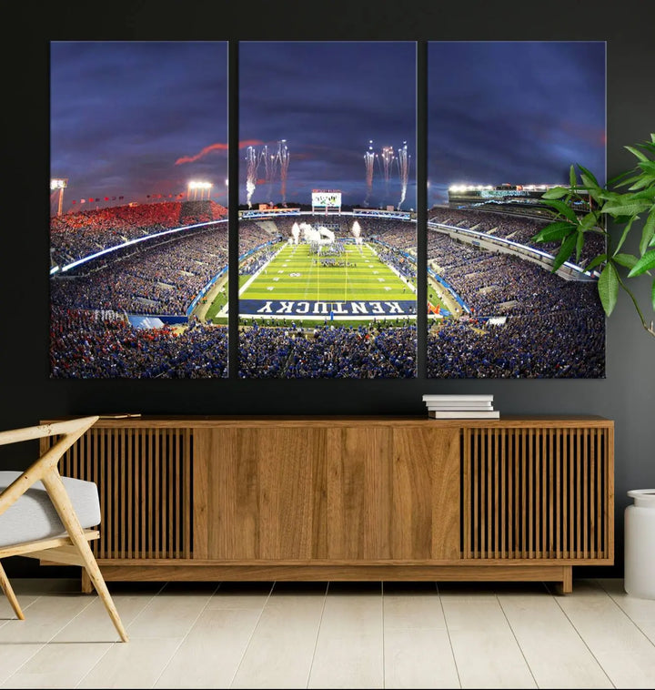 The Kroger Field Canvas Wall Art beautifully captures the thrill of a stadium filled with spectators during a football game, illuminated by fireworks in the evening sky. This handmade piece offers a gallery-quality finish on premium canvas, making it an ideal addition to your home or office.