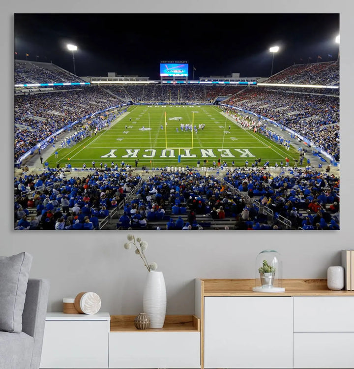 A sunset football game at Kroger Field in Lexington, with Kentucky showcased on the field, transforms into a stunning wall art piece. This premium canvas artwork, handmade in the USA, vividly encapsulates the vibrant energy and excitement of this memorable sports moment.