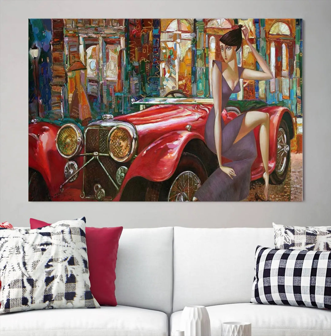 The modern living room is adorned with the "Lady With a Red Antique Car Wall Art Canvas Print," a triptych featuring a vintage red car and woman. This museum-quality canvas is ready to hang with a UV-protective coating to ensure lasting vibrancy.