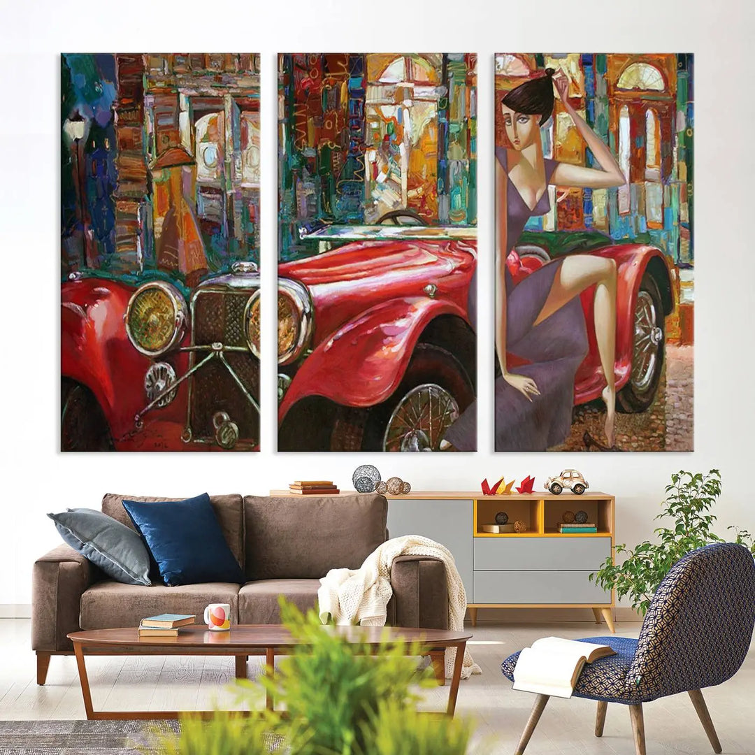 The modern living room is adorned with the "Lady With a Red Antique Car Wall Art Canvas Print," a triptych featuring a vintage red car and woman. This museum-quality canvas is ready to hang with a UV-protective coating to ensure lasting vibrancy.