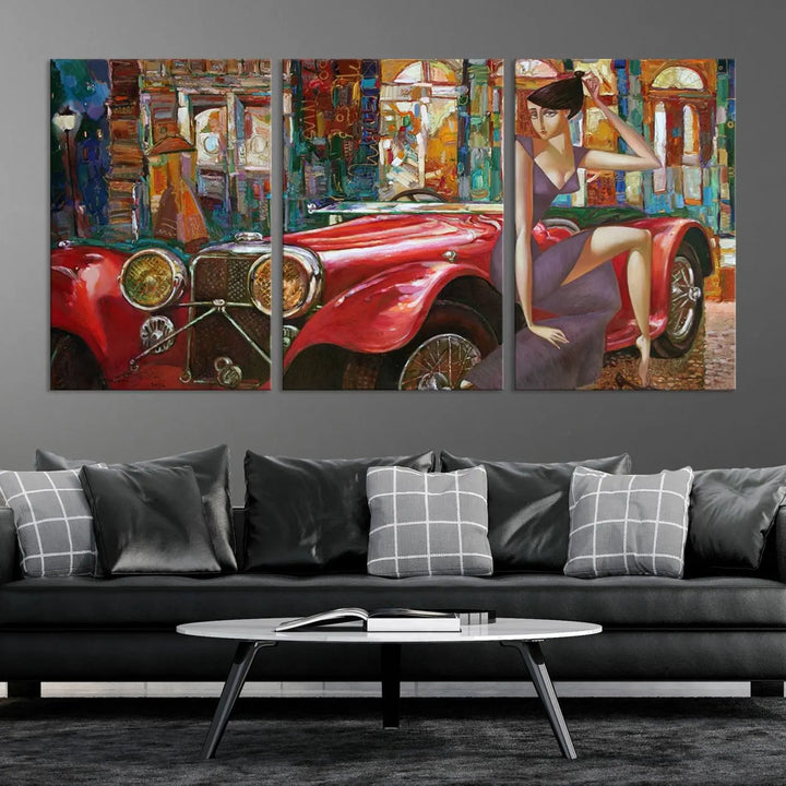 The modern living room is adorned with the "Lady With a Red Antique Car Wall Art Canvas Print," a triptych featuring a vintage red car and woman. This museum-quality canvas is ready to hang with a UV-protective coating to ensure lasting vibrancy.