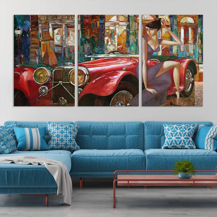 The modern living room is adorned with the "Lady With a Red Antique Car Wall Art Canvas Print," a triptych featuring a vintage red car and woman. This museum-quality canvas is ready to hang with a UV-protective coating to ensure lasting vibrancy.