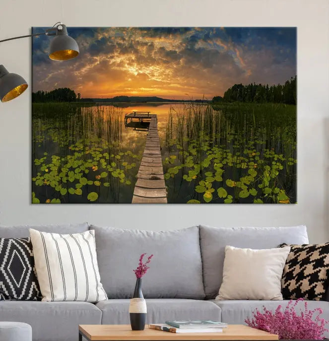 The Lake and Flower Wall Art Canvas Print, crafted on museum-quality canvas and featuring a UV-protective coating, elegantly adorns the space. Ready to hang, it captures the serene beauty of a lake sunset with a pier, transforming your living area into an inviting oasis.