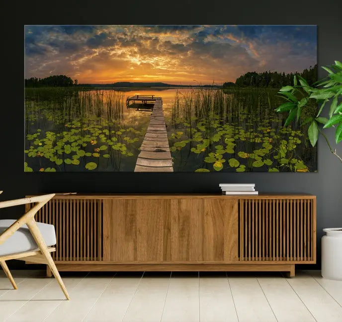 The Lake and Flower Wall Art Canvas Print, crafted on museum-quality canvas and featuring a UV-protective coating, elegantly adorns the space. Ready to hang, it captures the serene beauty of a lake sunset with a pier, transforming your living area into an inviting oasis.