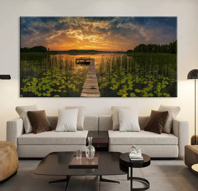 The Lake and Flower Wall Art Canvas Print, crafted on museum-quality canvas and featuring a UV-protective coating, elegantly adorns the space. Ready to hang, it captures the serene beauty of a lake sunset with a pier, transforming your living area into an inviting oasis.