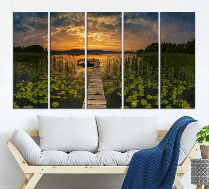 The Lake and Flower Wall Art Canvas Print, crafted on museum-quality canvas and featuring a UV-protective coating, elegantly adorns the space. Ready to hang, it captures the serene beauty of a lake sunset with a pier, transforming your living area into an inviting oasis.