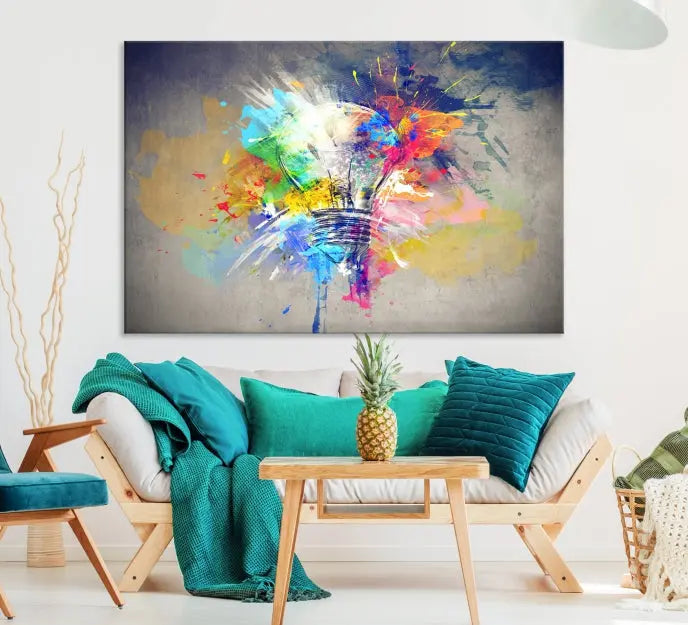 The Lamp Abstract Color Wall Art Canvas Print showcases vibrant splashes of color around a light bulb design. This museum-quality canvas comes ready to hang and features a UV-protective coating to keep its colors vivid and striking for years.