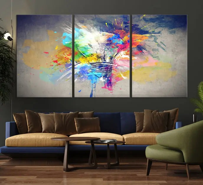 The Lamp Abstract Color Wall Art Canvas Print showcases vibrant splashes of color around a light bulb design. This museum-quality canvas comes ready to hang and features a UV-protective coating to keep its colors vivid and striking for years.