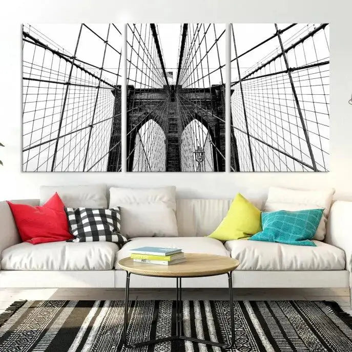 The Large Brooklyn Bridge Wall Art Canvas Print, a black and white photograph of a bridge, is elegantly displayed in two panels. The artwork is printed on museum-quality canvases.