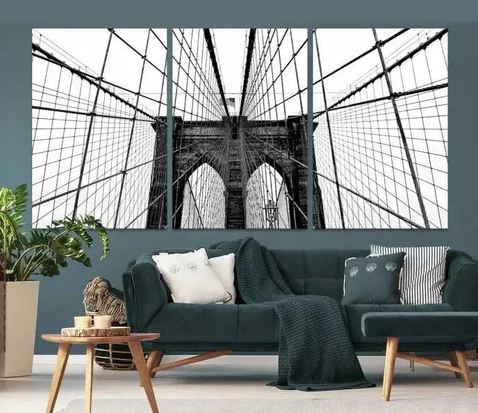 The Large Brooklyn Bridge Wall Art Canvas Print, a black and white photograph of a bridge, is elegantly displayed in two panels. The artwork is printed on museum-quality canvases.