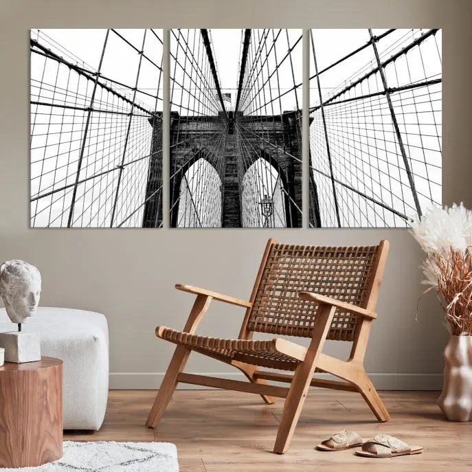 The Large Brooklyn Bridge Wall Art Canvas Print, a black and white photograph of a bridge, is elegantly displayed in two panels. The artwork is printed on museum-quality canvases.