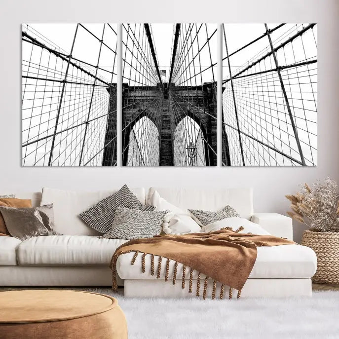 The Large Brooklyn Bridge Wall Art Canvas Print, a black and white photograph of a bridge, is elegantly displayed in two panels. The artwork is printed on museum-quality canvases.