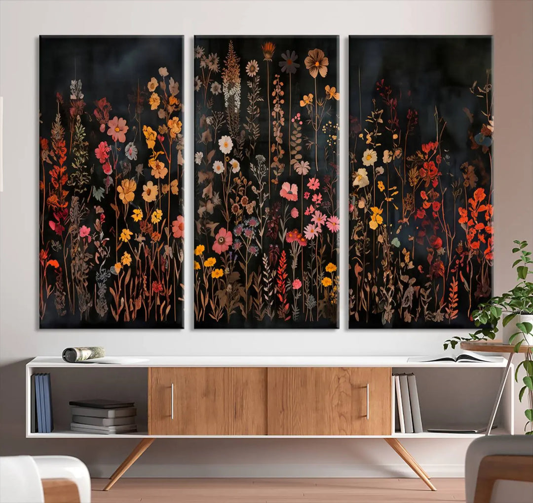 Above the modern sofa, a vibrant world map canvas triptych is accompanied by the "Large Floral Painting Print Illustration Flowers Canvas Wall Art Botanical Wall Decor Modern Wildflower Poster.