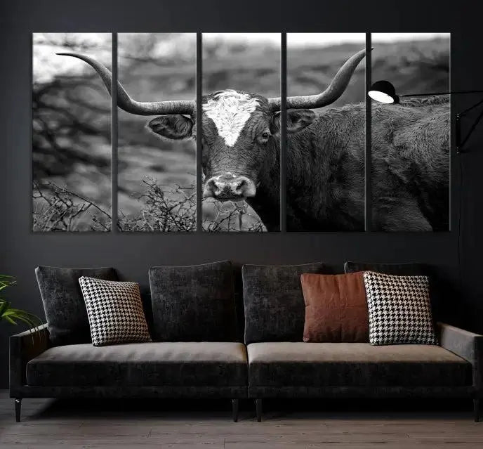 A black and white triptych featuring the "Large Longhorn Bull Wall Art Canvas Print" exudes a rustic and timeless feel.
