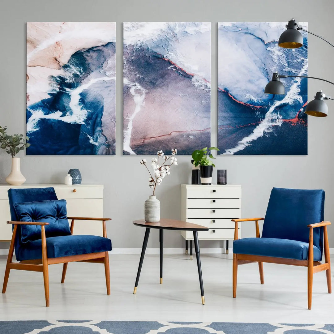 A contemporary living room showcasing the "Large Modern Abstract Canvas Wall Art Print" on museum-quality canvas. The artwork is elegantly framed in the USA for a touch of sophistication.