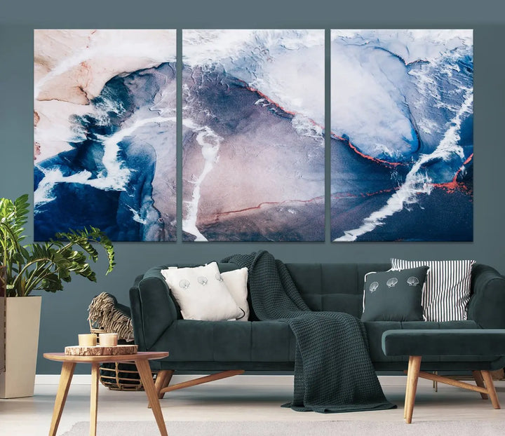 A contemporary living room showcasing the "Large Modern Abstract Canvas Wall Art Print" on museum-quality canvas. The artwork is elegantly framed in the USA for a touch of sophistication.