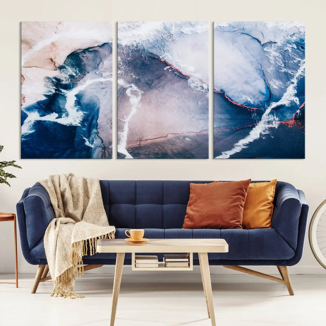 A contemporary living room showcasing the "Large Modern Abstract Canvas Wall Art Print" on museum-quality canvas. The artwork is elegantly framed in the USA for a touch of sophistication.