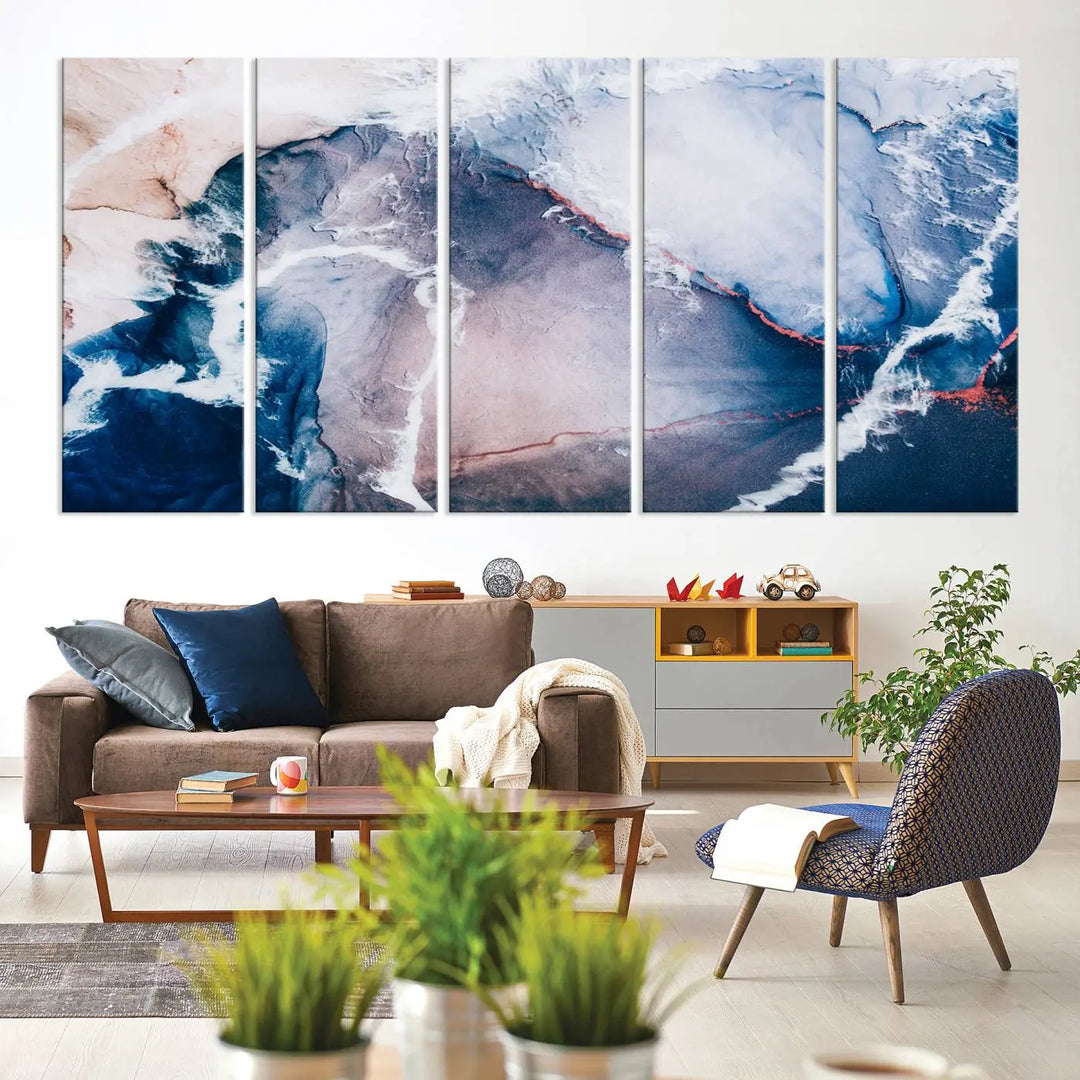 A contemporary living room showcasing the "Large Modern Abstract Canvas Wall Art Print" on museum-quality canvas. The artwork is elegantly framed in the USA for a touch of sophistication.