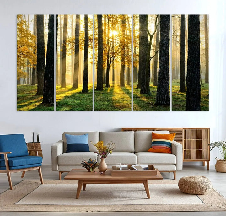 A large wall art landscape canvas print of tall trees at sunset.