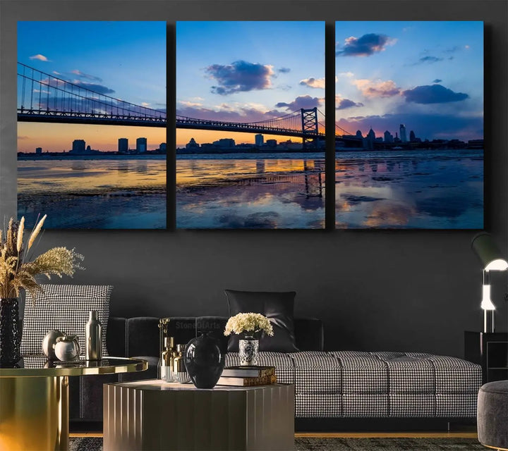 A photograph titled "Large Wall Art Philadelphia Canvas Print - Benjamin Franklin Bridge at Sunset" displays a breathtaking cityscape of the bridge reflected in the water. This image features a gallery-quality finish that promises to transform any space into an evocative memory.