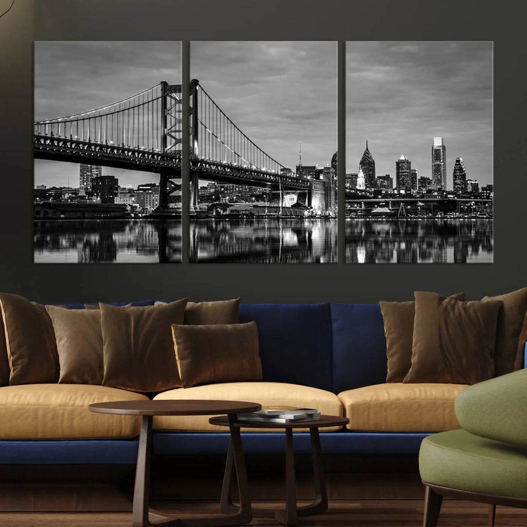 The "Large Wall Art Philadelphia Canvas Print" showcases a black-and-white depiction of the Ben Franklin Bridge with a water reflection.