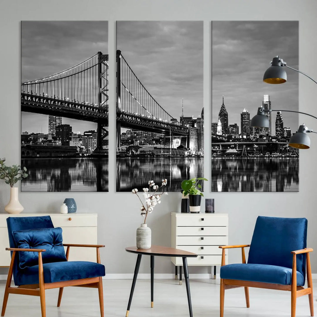 The "Large Wall Art Philadelphia Canvas Print" showcases a black-and-white depiction of the Ben Franklin Bridge with a water reflection.