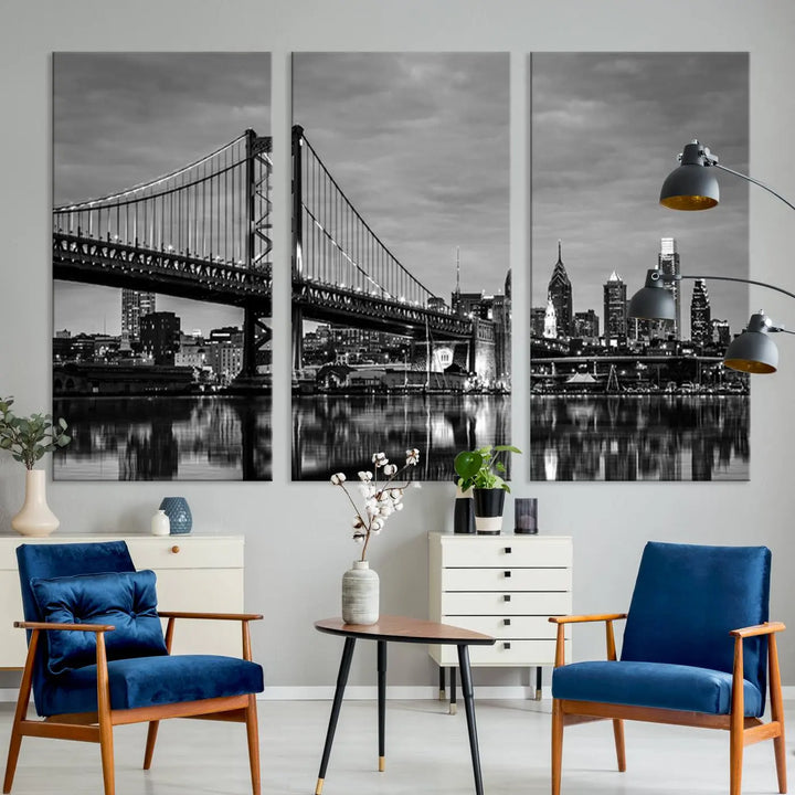 The "Large Wall Art Philadelphia Canvas Print" showcases a black-and-white depiction of the Ben Franklin Bridge with a water reflection.