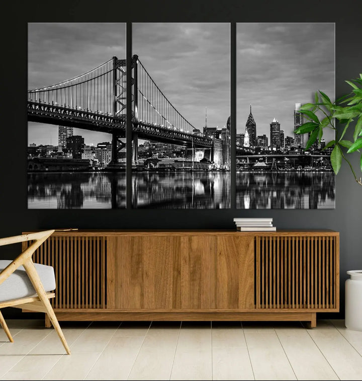 The "Large Wall Art Philadelphia Canvas Print" showcases a black-and-white depiction of the Ben Franklin Bridge with a water reflection.