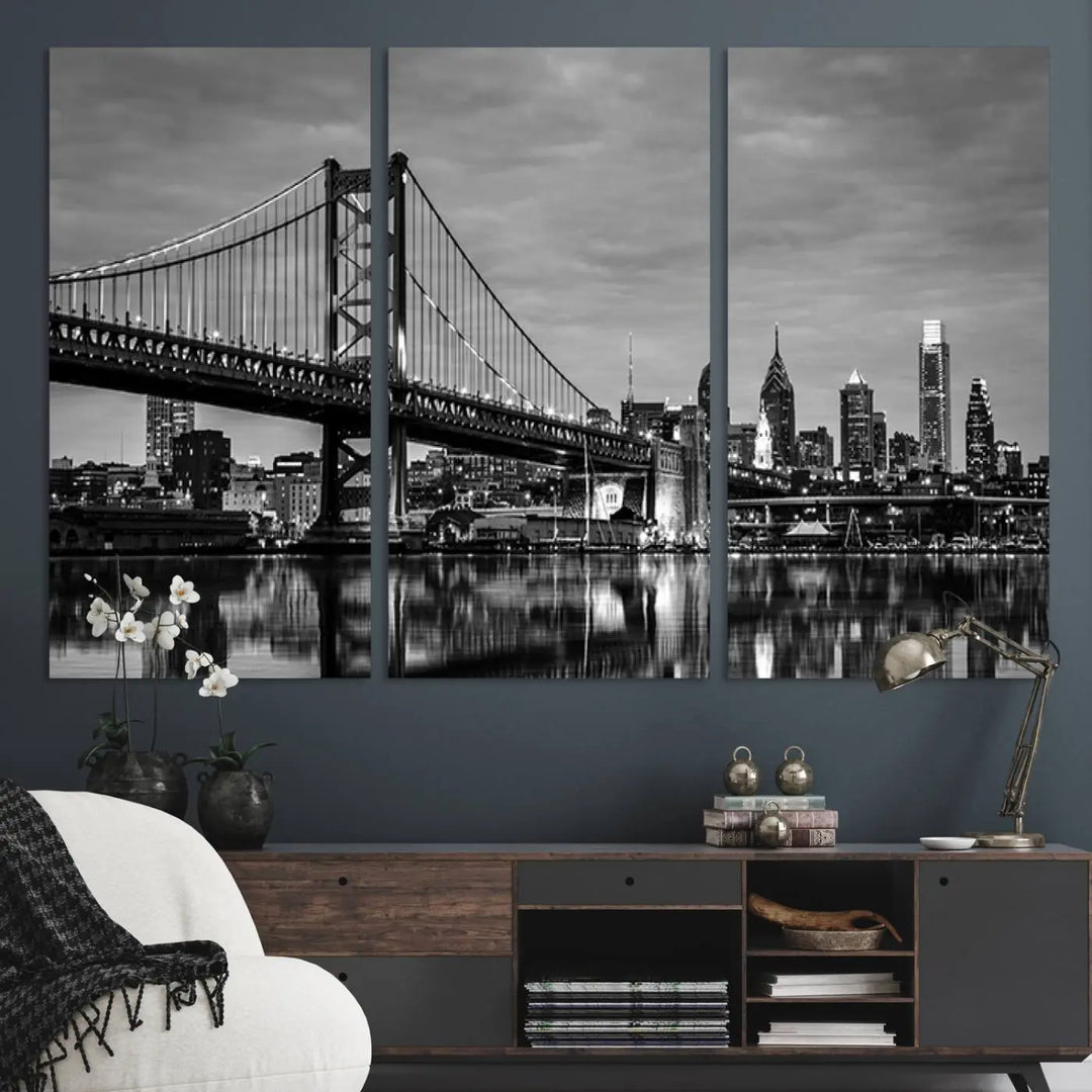 The "Large Wall Art Philadelphia Canvas Print" showcases a black-and-white depiction of the Ben Franklin Bridge with a water reflection.