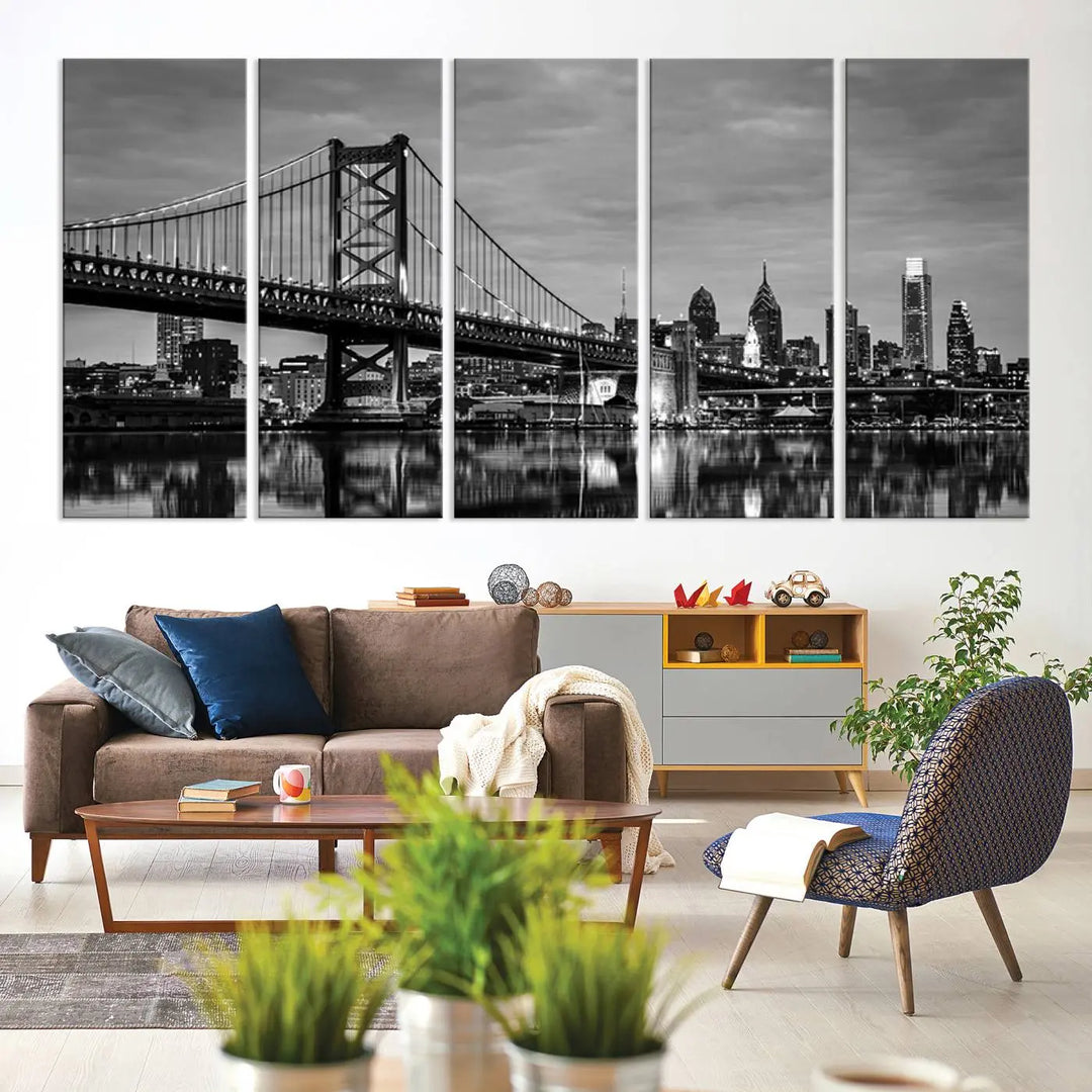 The "Large Wall Art Philadelphia Canvas Print" showcases a black-and-white depiction of the Ben Franklin Bridge with a water reflection.