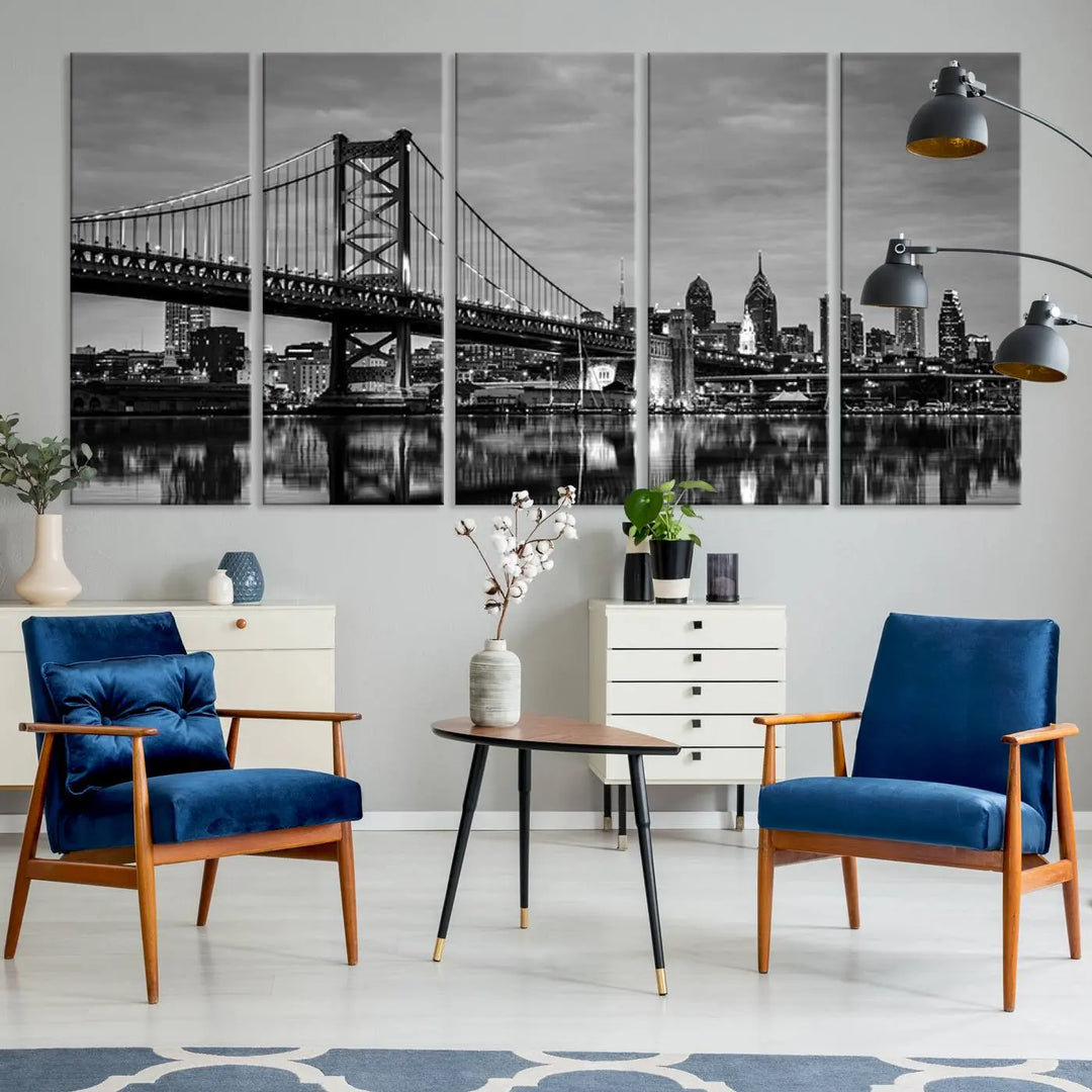 The "Large Wall Art Philadelphia Canvas Print" showcases a black-and-white depiction of the Ben Franklin Bridge with a water reflection.