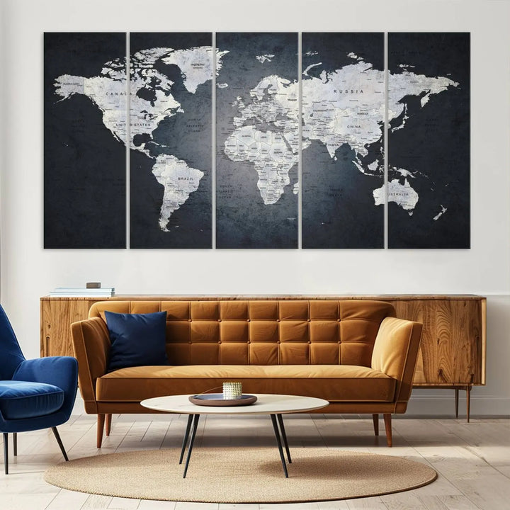 The Large Wall Art Push Pin World Map Canvas Print, featuring a three-panel design on museum-quality canvas, adorns the wall.