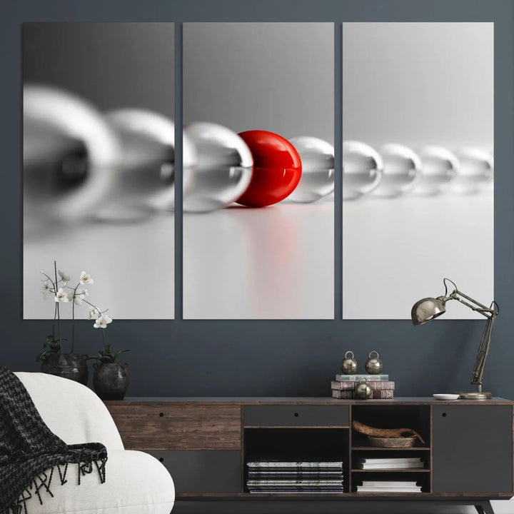 Displayed in a dining room, the Red Ball in Gray Balls canvas boasts a gallery-quality finish.