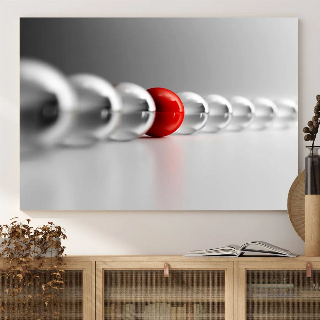 Displayed in a dining room, the Red Ball in Gray Balls canvas boasts a gallery-quality finish.