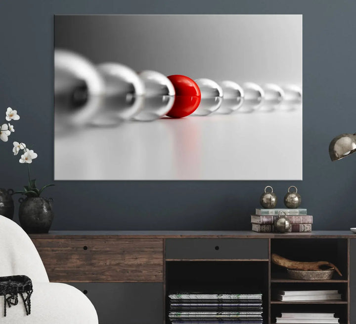 Displayed in a dining room, the Red Ball in Gray Balls canvas boasts a gallery-quality finish.