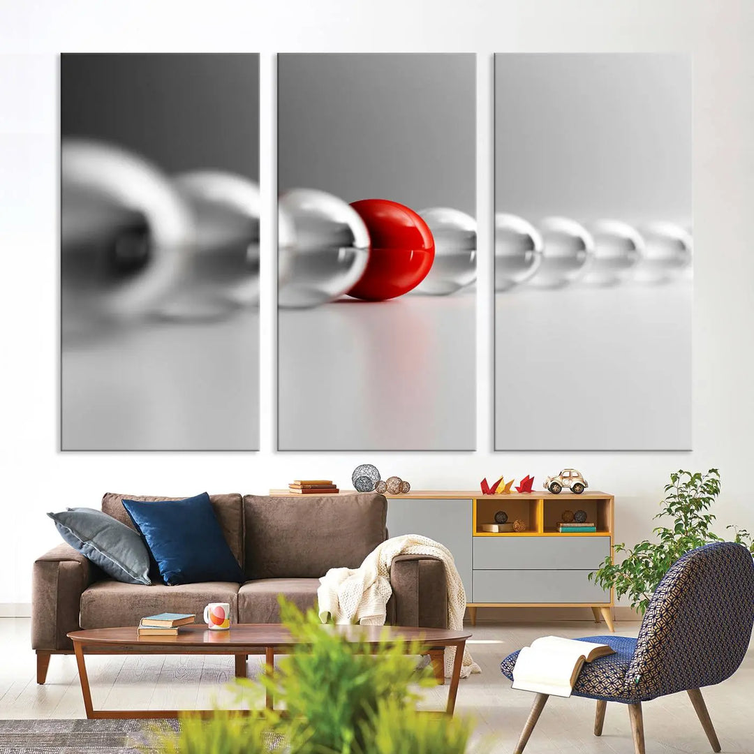 Displayed in a dining room, the Red Ball in Gray Balls canvas boasts a gallery-quality finish.