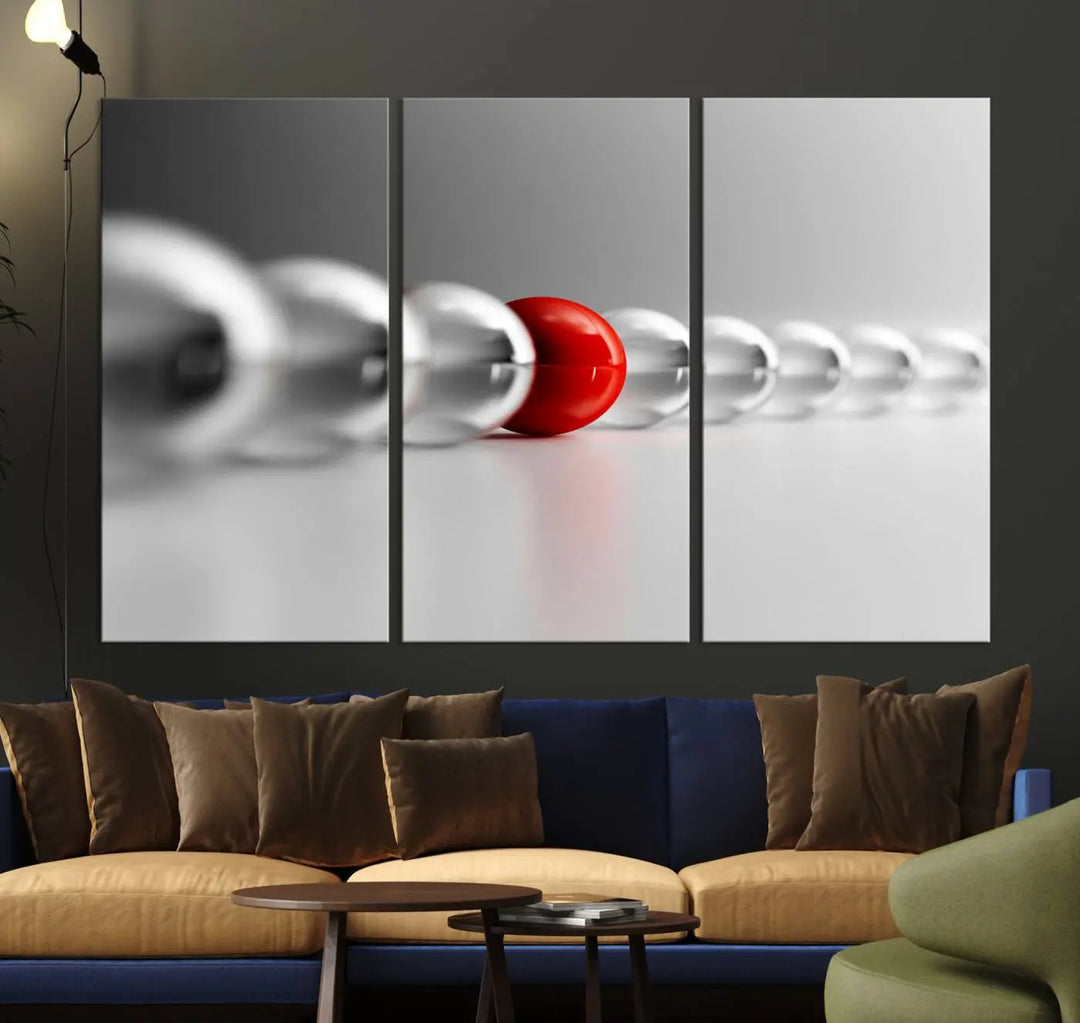 Displayed in a dining room, the Red Ball in Gray Balls canvas boasts a gallery-quality finish.