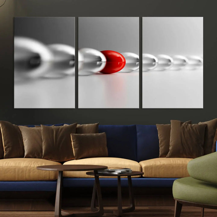 Displayed in a dining room, the Red Ball in Gray Balls canvas boasts a gallery-quality finish.