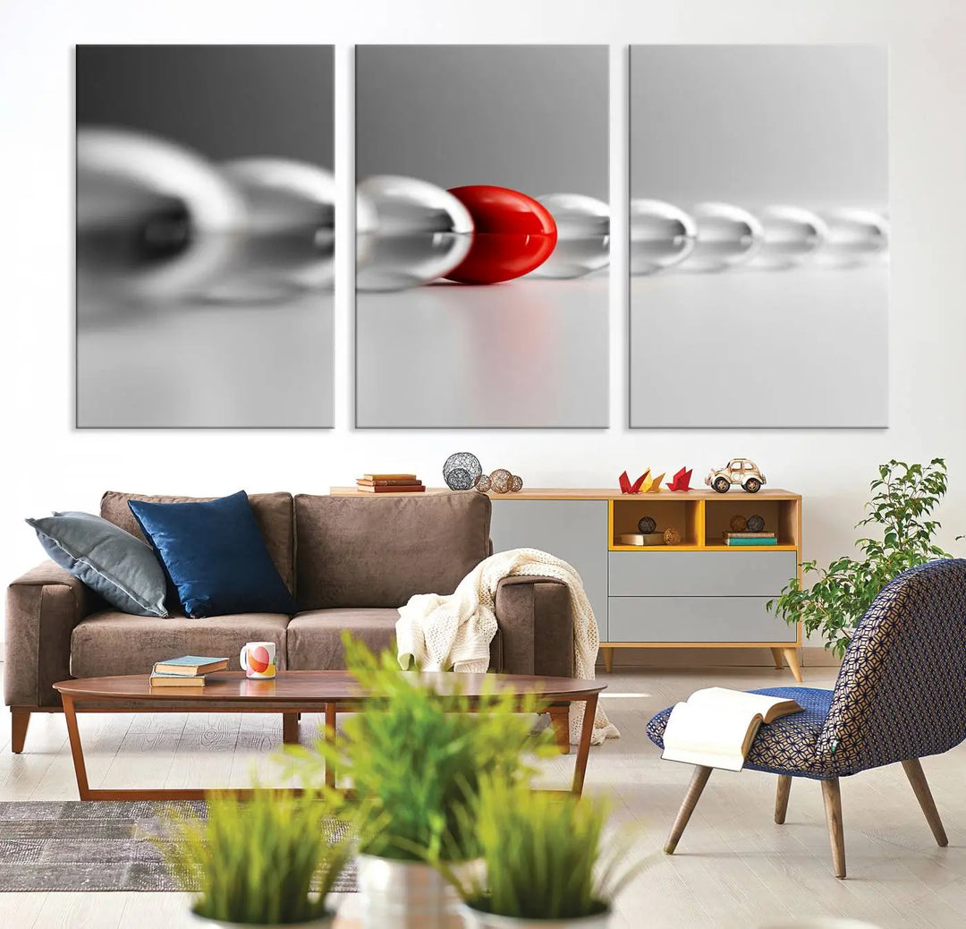 Displayed in a dining room, the Red Ball in Gray Balls canvas boasts a gallery-quality finish.