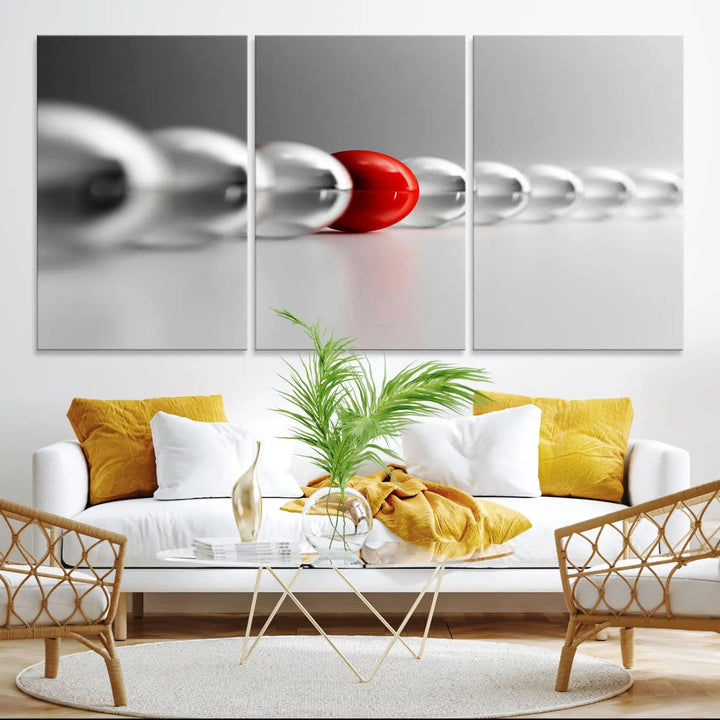 Displayed in a dining room, the Red Ball in Gray Balls canvas boasts a gallery-quality finish.