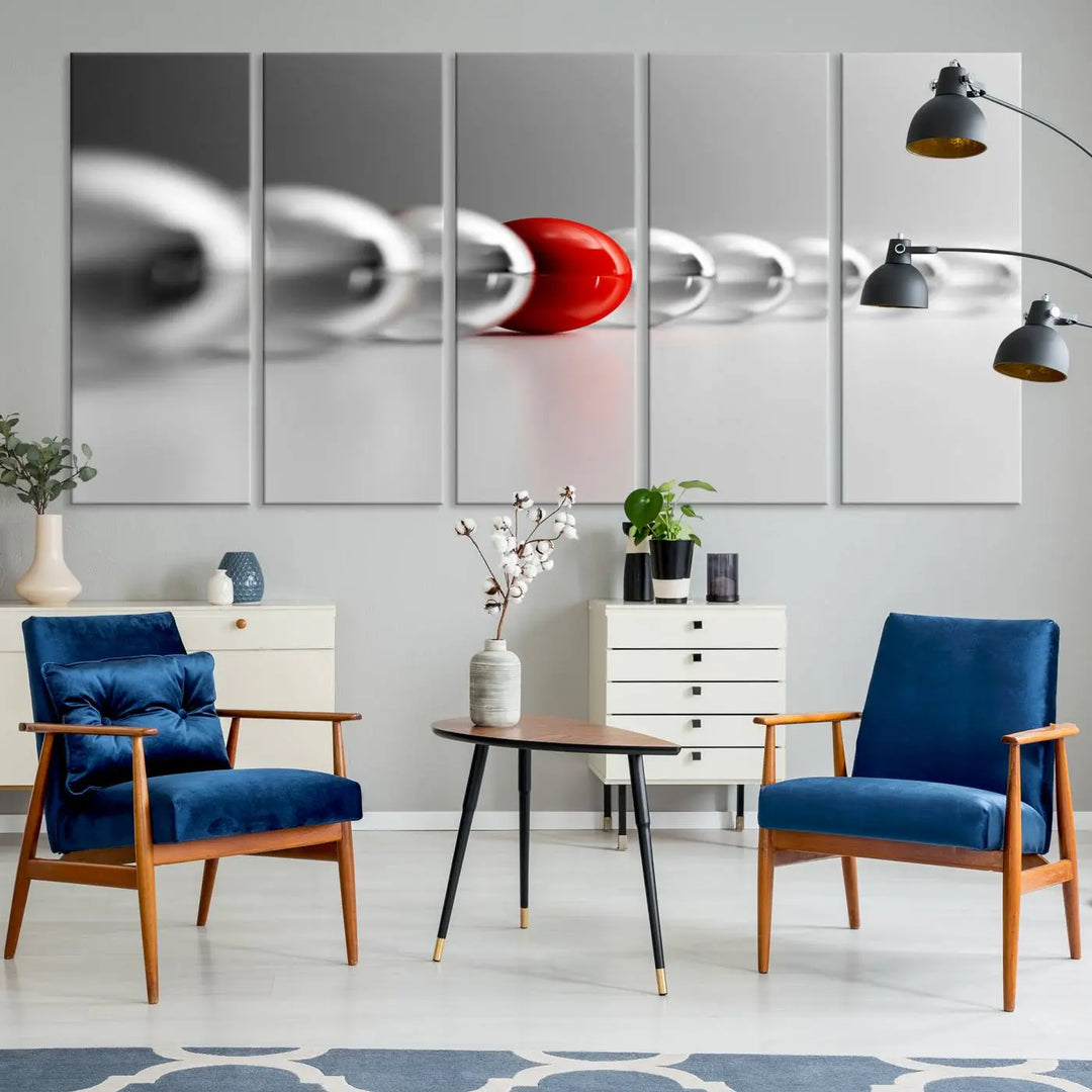 Displayed in a dining room, the Red Ball in Gray Balls canvas boasts a gallery-quality finish.