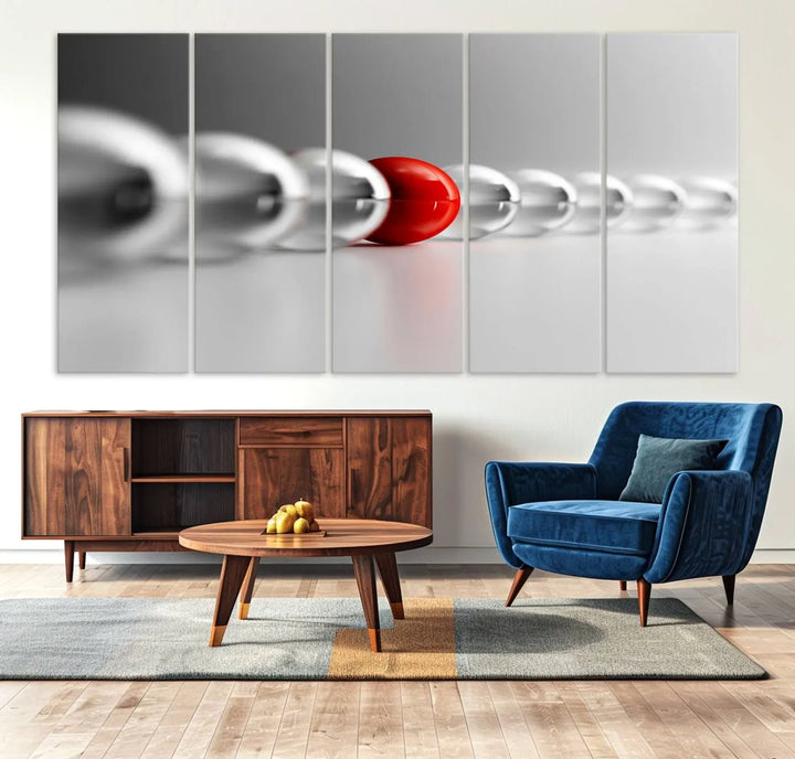 Displayed in a dining room, the Red Ball in Gray Balls canvas boasts a gallery-quality finish.