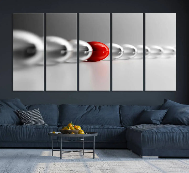 Displayed in a dining room, the Red Ball in Gray Balls canvas boasts a gallery-quality finish.