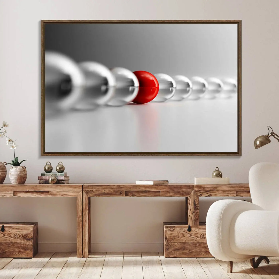 Displayed in a dining room, the Red Ball in Gray Balls canvas boasts a gallery-quality finish.